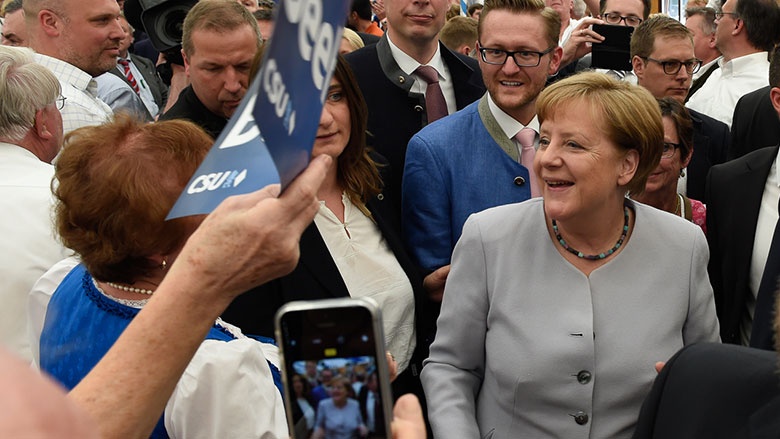 Einmarsch mit Angela Merkel Einmarsch mit Angela Merkel